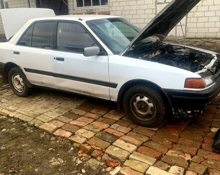 Белый Мазда 323, объемом двигателя 17 л и пробегом 0 тыс. км за 720 $, фото 1 на Automoto.ua