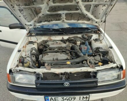 Белый Мазда 323, объемом двигателя 1.5 л и пробегом 315 тыс. км за 1400 $, фото 11 на Automoto.ua