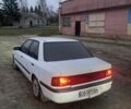 Белый Мазда 323, объемом двигателя 1.6 л и пробегом 999 тыс. км за 1000 $, фото 1 на Automoto.ua