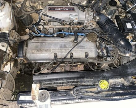 Белый Мазда 323, объемом двигателя 1.6 л и пробегом 999 тыс. км за 1000 $, фото 6 на Automoto.ua