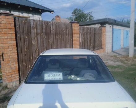 Белый Мазда 323, объемом двигателя 1 л и пробегом 320 тыс. км за 1000 $, фото 3 на Automoto.ua