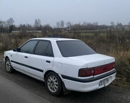 Белый Мазда 323, объемом двигателя 1.6 л и пробегом 999 тыс. км за 1000 $, фото 2 на Automoto.ua