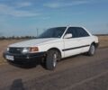 Белый Мазда 323, объемом двигателя 1.6 л и пробегом 50 тыс. км за 557 $, фото 1 на Automoto.ua
