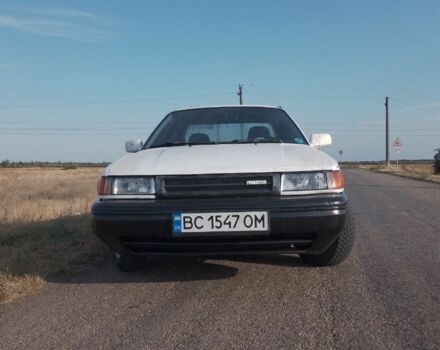 Белый Мазда 323, объемом двигателя 1.6 л и пробегом 50 тыс. км за 557 $, фото 1 на Automoto.ua