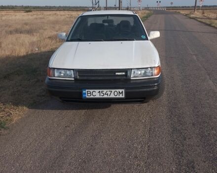 Белый Мазда 323, объемом двигателя 1.6 л и пробегом 50 тыс. км за 557 $, фото 2 на Automoto.ua