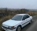 Белый Мазда 323, объемом двигателя 1.6 л и пробегом 999 тыс. км за 1000 $, фото 1 на Automoto.ua