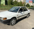 Белый Мазда 323, объемом двигателя 1.7 л и пробегом 196 тыс. км за 1400 $, фото 1 на Automoto.ua