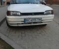 Белый Мазда 323, объемом двигателя 1.7 л и пробегом 250 тыс. км за 900 $, фото 1 на Automoto.ua