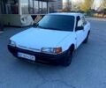 Белый Мазда 323, объемом двигателя 1.7 л и пробегом 350 тыс. км за 900 $, фото 1 на Automoto.ua