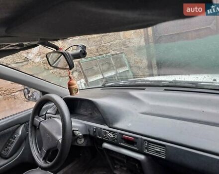 Белый Мазда 323, объемом двигателя 1.7 л и пробегом 600 тыс. км за 800 $, фото 4 на Automoto.ua
