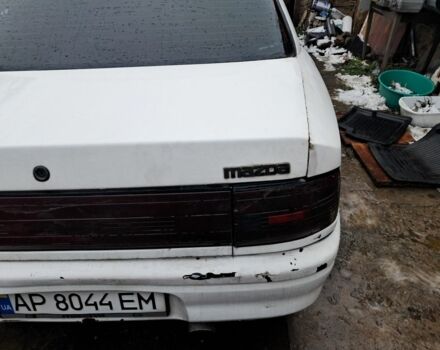 Белый Мазда 323, объемом двигателя 1.7 л и пробегом 600 тыс. км за 800 $, фото 1 на Automoto.ua