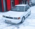 Белый Мазда 323, объемом двигателя 1.8 л и пробегом 250 тыс. км за 650 $, фото 1 на Automoto.ua