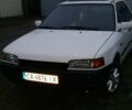Белый Мазда 323, объемом двигателя 1.7 л и пробегом 470 тыс. км за 2500 $, фото 1 на Automoto.ua