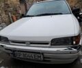 Белый Мазда 323, объемом двигателя 1.7 л и пробегом 600 тыс. км за 800 $, фото 1 на Automoto.ua