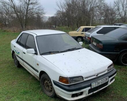 Белый Мазда 323, объемом двигателя 1.7 л и пробегом 300 тыс. км за 850 $, фото 1 на Automoto.ua