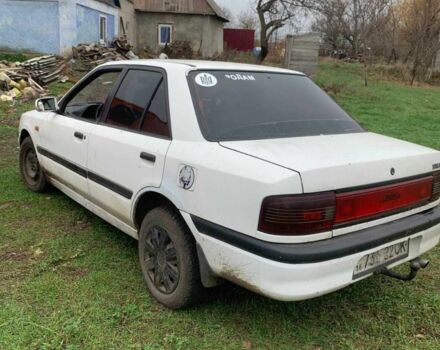 Белый Мазда 323, объемом двигателя 1.7 л и пробегом 300 тыс. км за 850 $, фото 4 на Automoto.ua