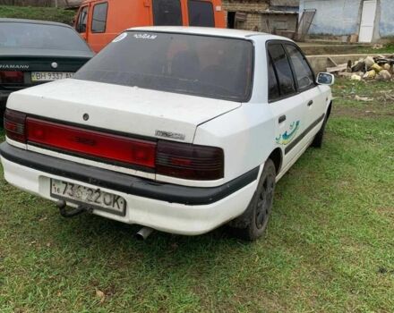 Белый Мазда 323, объемом двигателя 1.7 л и пробегом 300 тыс. км за 850 $, фото 3 на Automoto.ua