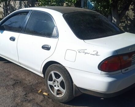 Белый Мазда 323, объемом двигателя 0 л и пробегом 485 тыс. км за 2200 $, фото 2 на Automoto.ua