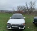 Белый Мазда 323, объемом двигателя 1.7 л и пробегом 300 тыс. км за 850 $, фото 1 на Automoto.ua