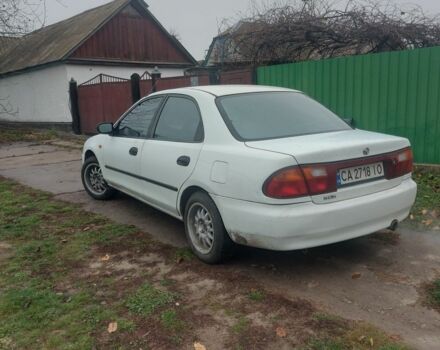 Белый Мазда 323, объемом двигателя 1.5 л и пробегом 330 тыс. км за 1850 $, фото 1 на Automoto.ua