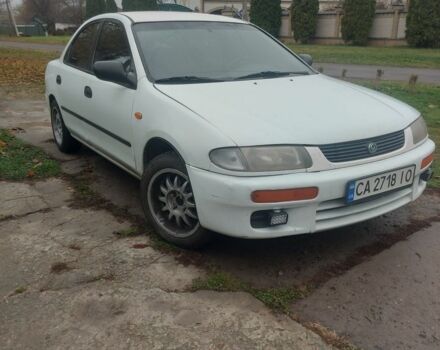 Белый Мазда 323, объемом двигателя 1.5 л и пробегом 330 тыс. км за 1850 $, фото 3 на Automoto.ua