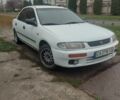 Белый Мазда 323, объемом двигателя 1.5 л и пробегом 330 тыс. км за 1850 $, фото 3 на Automoto.ua