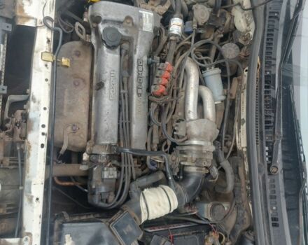 Белый Мазда 323, объемом двигателя 1.5 л и пробегом 330 тыс. км за 1850 $, фото 4 на Automoto.ua