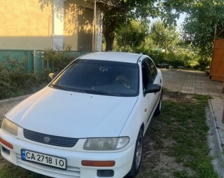 Белый Мазда 323, объемом двигателя 1.5 л и пробегом 200 тыс. км за 2200 $, фото 1 на Automoto.ua