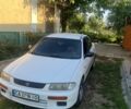 Белый Мазда 323, объемом двигателя 1.5 л и пробегом 200 тыс. км за 2200 $, фото 1 на Automoto.ua