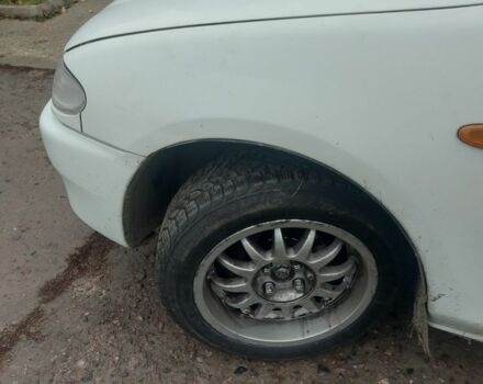 Белый Мазда 323, объемом двигателя 1.5 л и пробегом 330 тыс. км за 1850 $, фото 5 на Automoto.ua