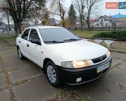 Белый Мазда 323, объемом двигателя 1.5 л и пробегом 420 тыс. км за 2750 $, фото 5 на Automoto.ua