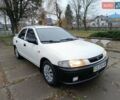 Белый Мазда 323, объемом двигателя 1.5 л и пробегом 420 тыс. км за 2750 $, фото 5 на Automoto.ua