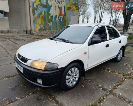 Белый Мазда 323, объемом двигателя 1.5 л и пробегом 420 тыс. км за 2750 $, фото 16 на Automoto.ua