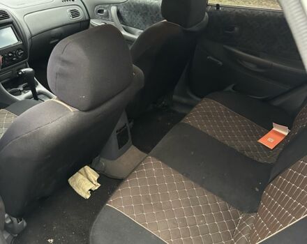 Белый Мазда 323, объемом двигателя 2 л и пробегом 300 тыс. км за 999 $, фото 6 на Automoto.ua