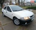 Белый Мазда 323, объемом двигателя 1.5 л и пробегом 420 тыс. км за 2750 $, фото 1 на Automoto.ua