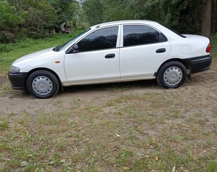 Белый Мазда 323, объемом двигателя 1.5 л и пробегом 423 тыс. км за 1850 $, фото 5 на Automoto.ua