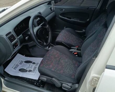 Белый Мазда 323, объемом двигателя 1.5 л и пробегом 420 тыс. км за 2750 $, фото 15 на Automoto.ua