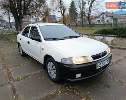 Белый Мазда 323, объемом двигателя 1.5 л и пробегом 420 тыс. км за 2750 $, фото 3 на Automoto.ua