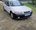 Белый Мазда 323, объемом двигателя 1.5 л и пробегом 423 тыс. км за 1850 $, фото 1 на Automoto.ua