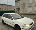 Белый Мазда 323, объемом двигателя 2 л и пробегом 300 тыс. км за 999 $, фото 2 на Automoto.ua