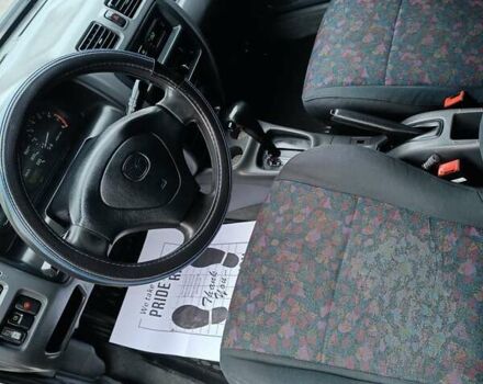 Белый Мазда 323, объемом двигателя 1.5 л и пробегом 420 тыс. км за 2750 $, фото 17 на Automoto.ua