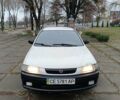 Белый Мазда 323, объемом двигателя 1.5 л и пробегом 431 тыс. км за 2699 $, фото 4 на Automoto.ua