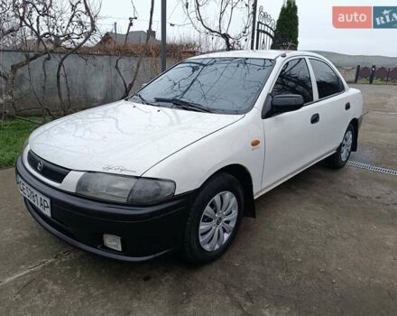 Белый Мазда 323, объемом двигателя 1.5 л и пробегом 420 тыс. км за 2750 $, фото 27 на Automoto.ua