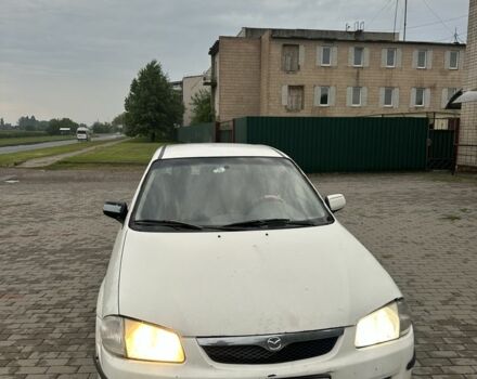 Белый Мазда 323, объемом двигателя 2 л и пробегом 300 тыс. км за 999 $, фото 1 на Automoto.ua
