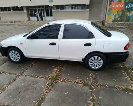 Белый Мазда 323, объемом двигателя 1.5 л и пробегом 420 тыс. км за 2750 $, фото 13 на Automoto.ua