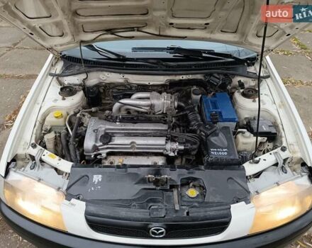 Белый Мазда 323, объемом двигателя 1.5 л и пробегом 420 тыс. км за 2750 $, фото 29 на Automoto.ua