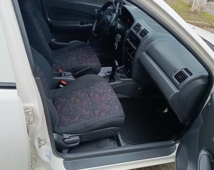 Белый Мазда 323, объемом двигателя 1.5 л и пробегом 420 тыс. км за 2750 $, фото 24 на Automoto.ua