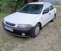 Белый Мазда 323, объемом двигателя 1.5 л и пробегом 423 тыс. км за 1850 $, фото 1 на Automoto.ua