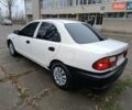 Белый Мазда 323, объемом двигателя 1.5 л и пробегом 420 тыс. км за 2750 $, фото 14 на Automoto.ua