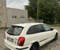 Белый Мазда 323, объемом двигателя 2 л и пробегом 300 тыс. км за 999 $, фото 3 на Automoto.ua